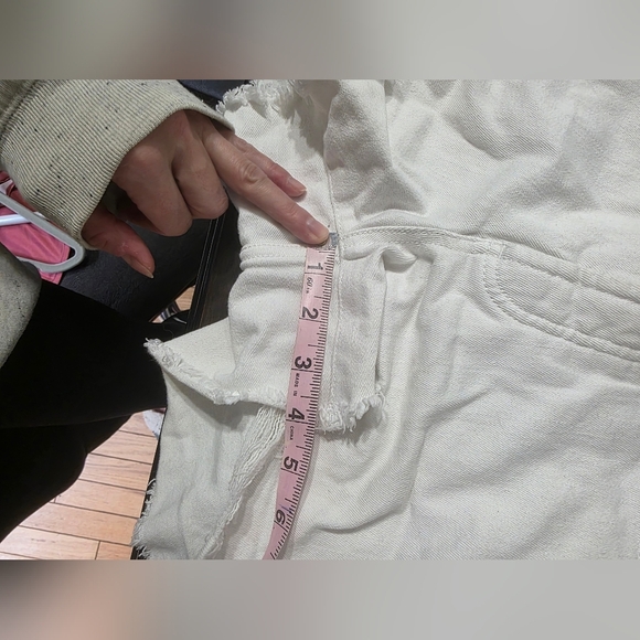 Calvin Klein White Distressed Denim Shorts - Picture 12 of 12